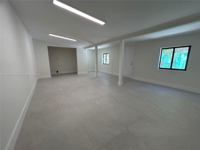 below grade area featuring baseboards
