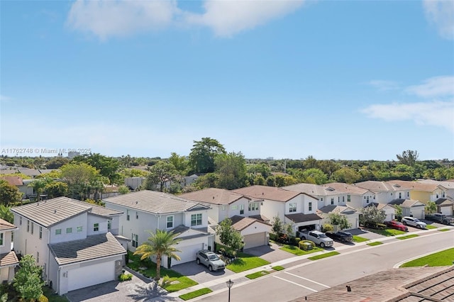 drone / aerial view with a residential view