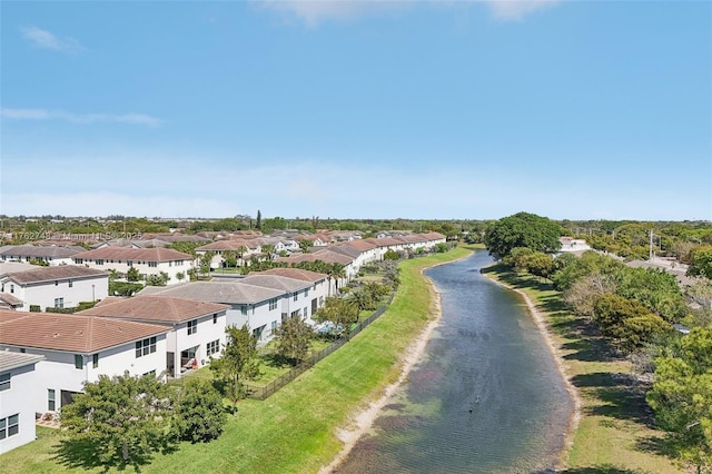 aerial view featuring a residential view and a water view