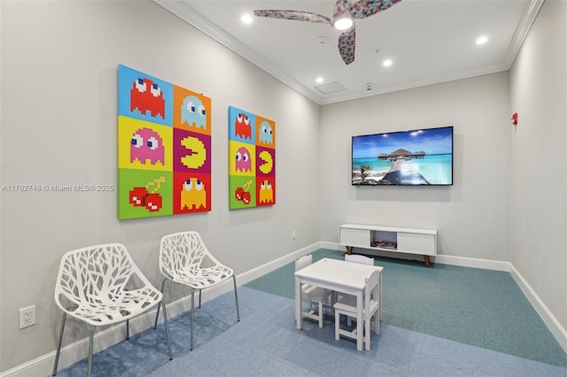 sitting room featuring crown molding, recessed lighting, and baseboards