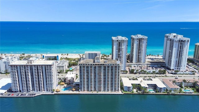 drone / aerial view with a view of city and a water view