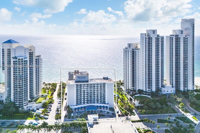 bird's eye view featuring a view of city and a water view