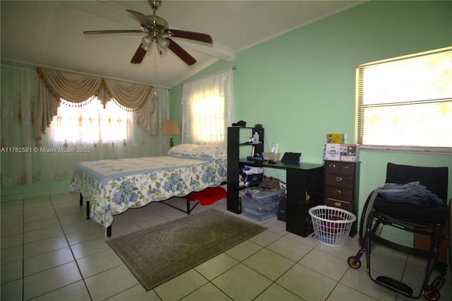 tiled bedroom featuring vaulted ceiling with beams and ceiling fan