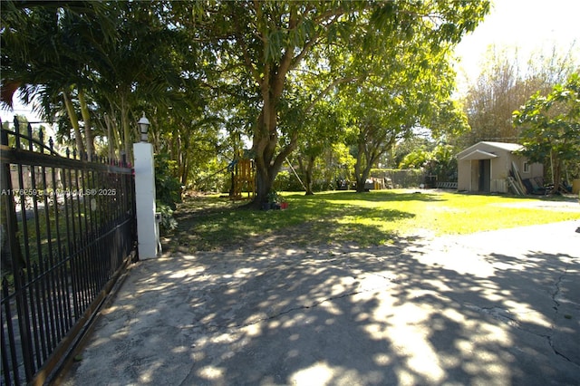 exterior space with a yard and fence