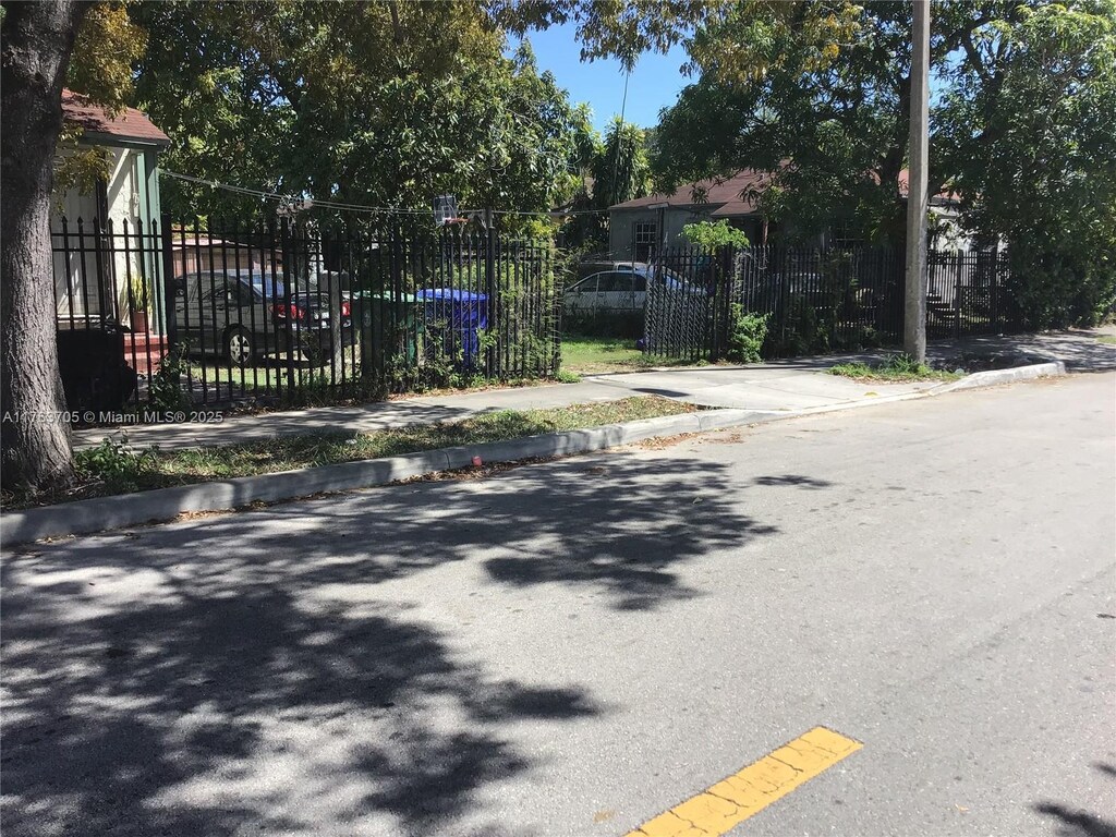 view of street with curbs and sidewalks