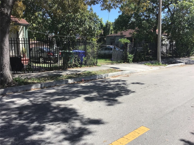 view of street with curbs and sidewalks