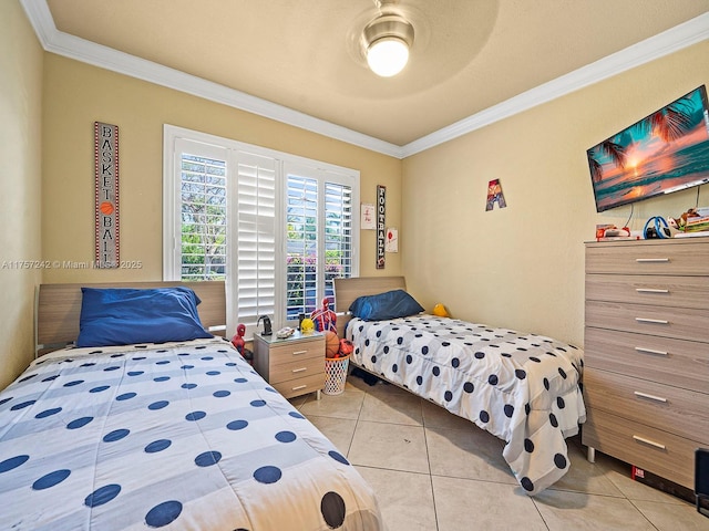 bedroom featuring light tile patterned floors, ceiling fan, and ornamental molding