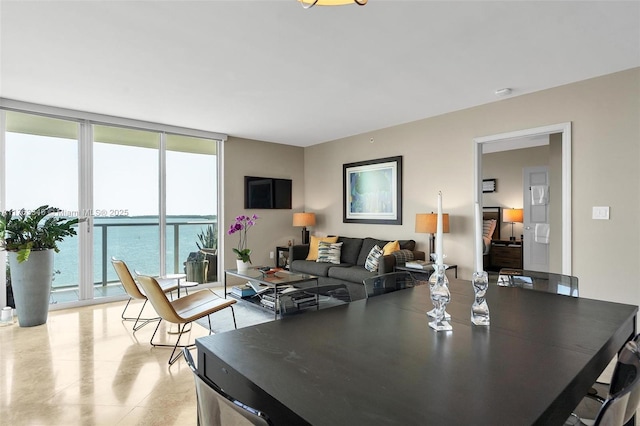 dining room featuring floor to ceiling windows