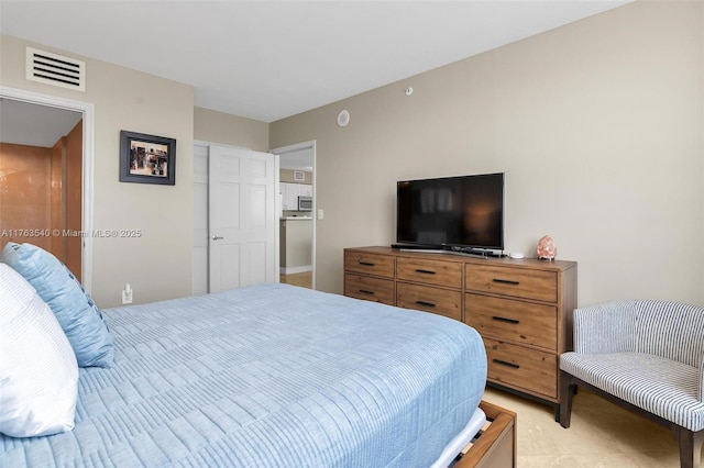 bedroom with visible vents