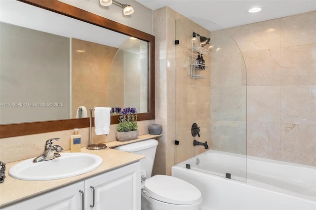 full bath with toilet, bathtub / shower combination, and vanity