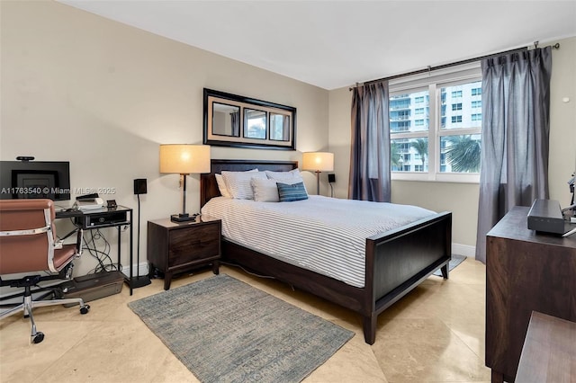 bedroom with baseboards