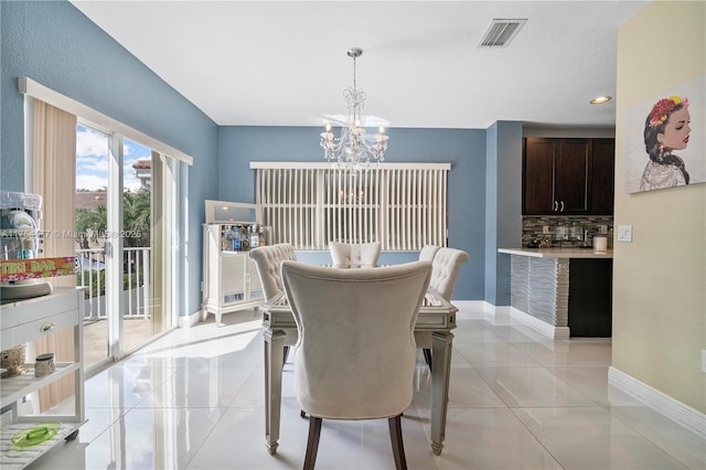 dining room featuring visible vents, baseboards, light tile patterned floors, recessed lighting, and an inviting chandelier