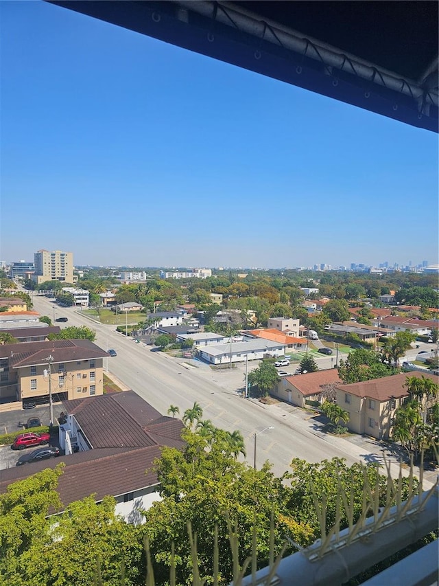 birds eye view of property featuring a city view