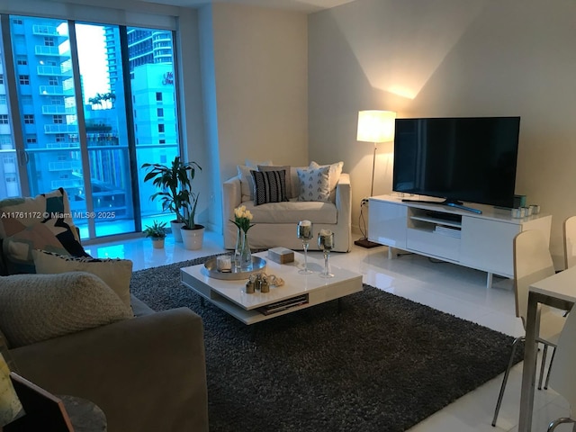 living room with tile patterned floors