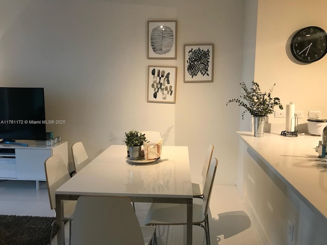 view of tiled dining room