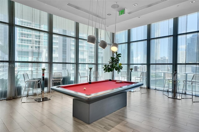 1100 S Miami Ave Unit 1103, Miami, FL 33130 - game room featuring a wall of windows, billiards, and wood finished floors