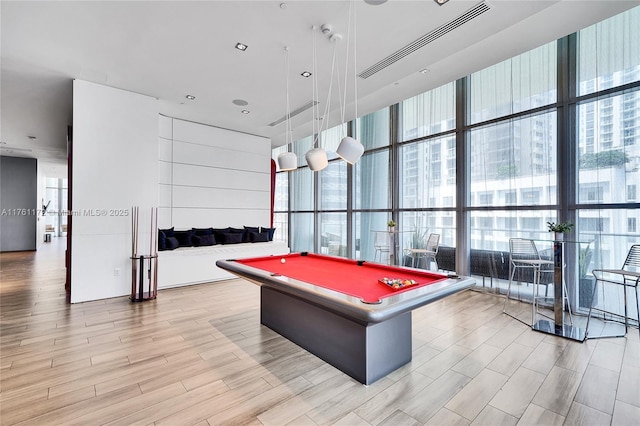 1100 S Miami Ave Unit 1103, Miami, FL 33130 - recreation room featuring a wall of windows, billiards table, and light wood finished floors