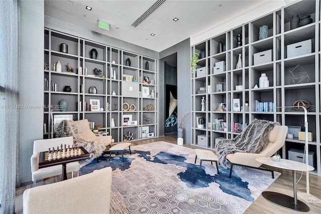 1100 S Miami Ave Unit 1103, Miami, FL 33130 - sitting room featuring wood finished floors and built in shelves