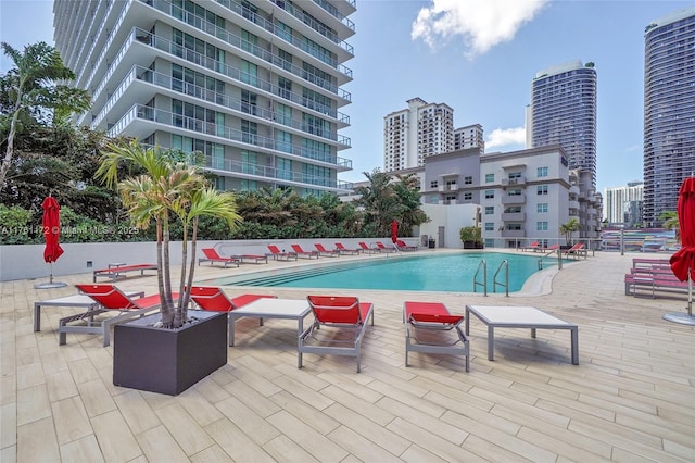 1100 S Miami Ave Unit 1103, Miami, FL 33130 - community pool with a patio and a city view