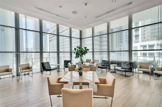 1100 S Miami Ave Unit 1103, Miami, FL 33130 - common area with floor to ceiling windows and a towering ceiling