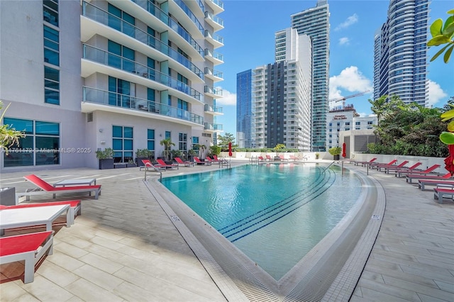 1100 S Miami Ave Unit 1103, Miami, FL 33130 - community pool featuring a patio and a city view