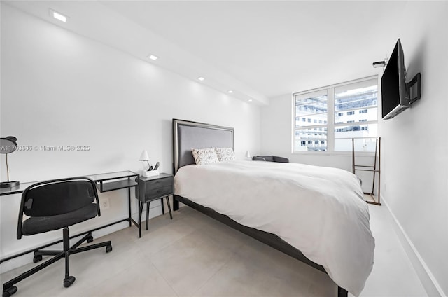 bedroom featuring recessed lighting and baseboards