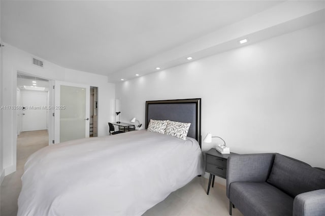 bedroom with visible vents and recessed lighting