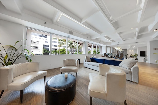 living room with beam ceiling, wood finished floors, and coffered ceiling