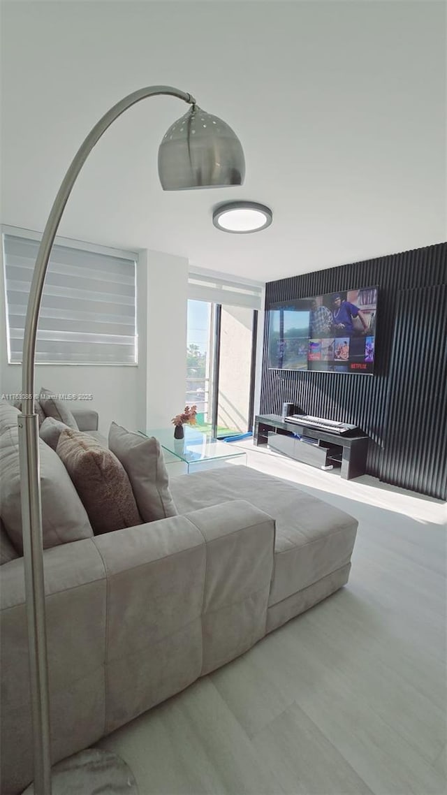 bedroom with floor to ceiling windows