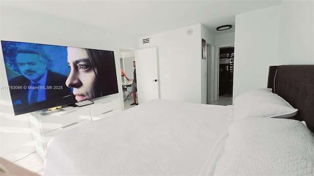 bedroom featuring visible vents