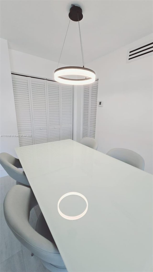 dining space with visible vents