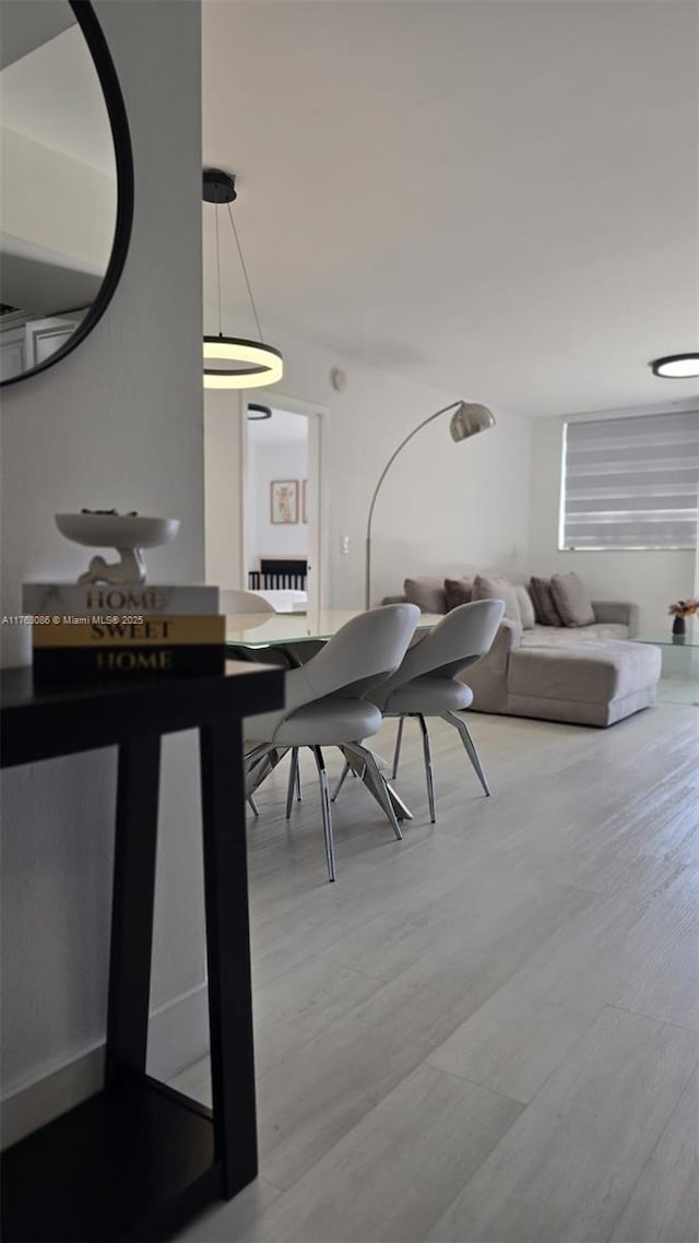 2821 N Miami Beach Blvd Unit 4F, North Miami Beach, FL 33160 - dining area featuring wood finished floors