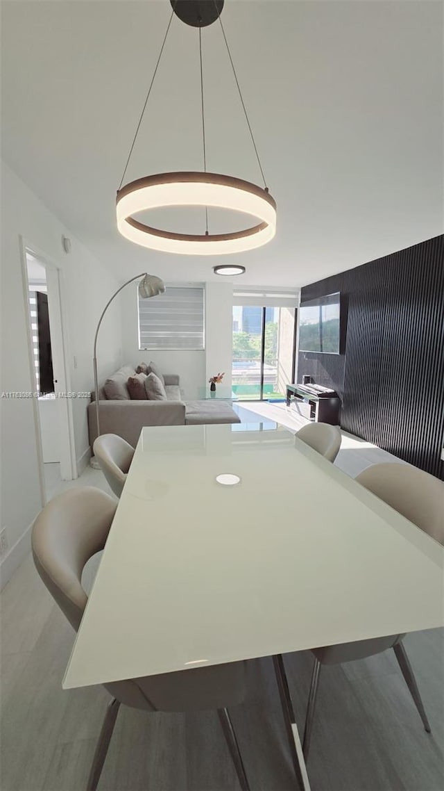 2821 N Miami Beach Blvd Unit 4F, North Miami Beach, FL 33160 - dining area with baseboards