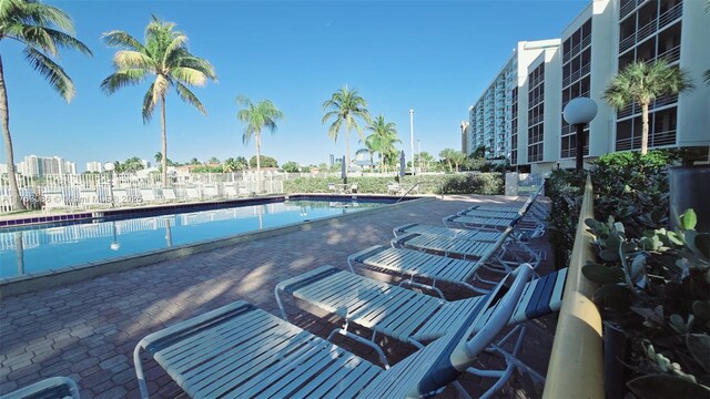 2821 N Miami Beach Blvd Unit 4F, North Miami Beach, FL 33160 - community pool with a patio area