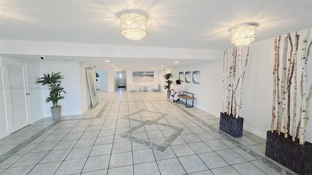 2821 N Miami Beach Blvd Unit 4F, North Miami Beach, FL 33160 - unfurnished living room featuring a chandelier, light tile patterned floors, and recessed lighting