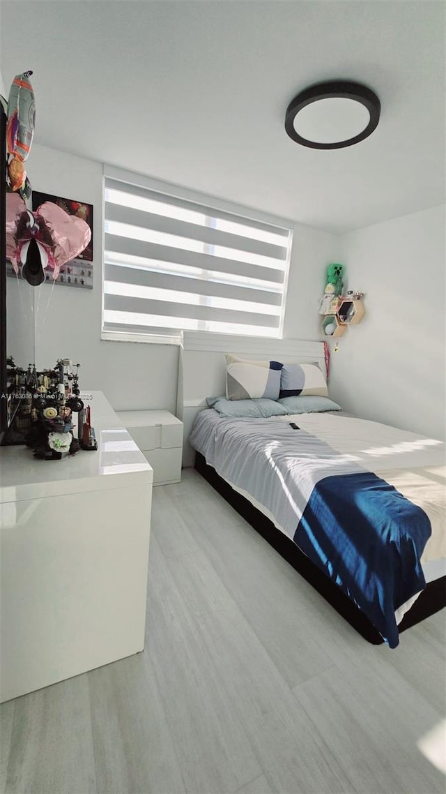 2821 N Miami Beach Blvd Unit 4F, North Miami Beach, FL 33160 - bedroom featuring wood finished floors
