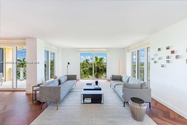 living room featuring baseboards