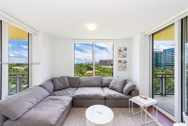 living room with floor to ceiling windows