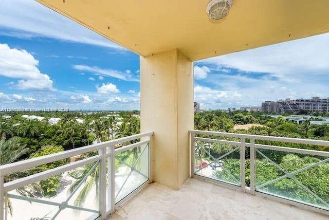 balcony featuring a city view