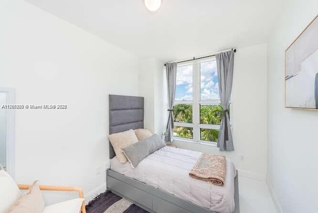 bedroom with baseboards