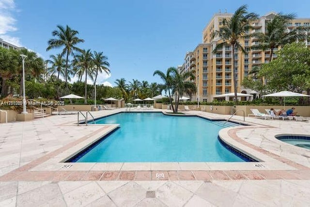 community pool featuring a patio