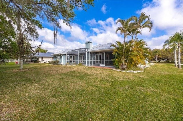 view of yard with a lanai