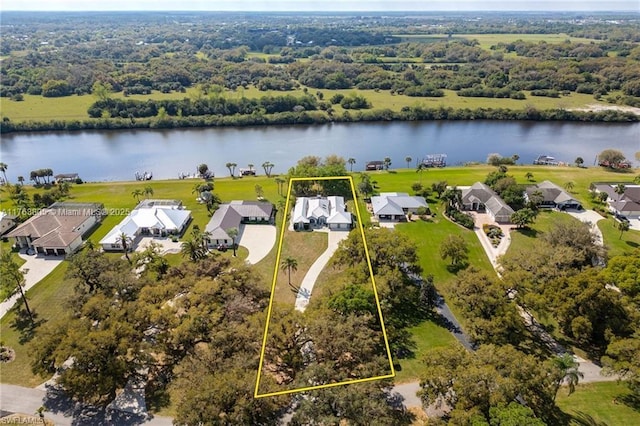 aerial view with a residential view and a water view