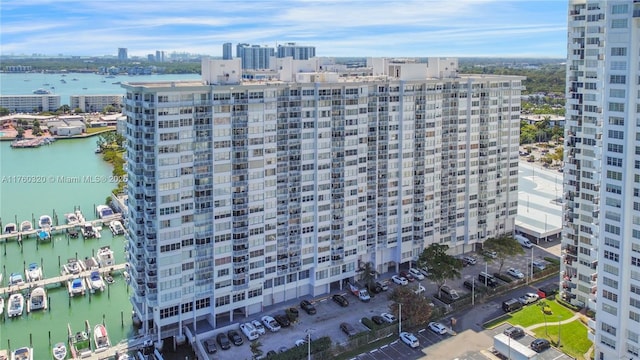 aerial view featuring a view of city and a water view