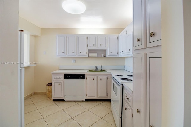 kitchen with white appliances, light tile patterned flooring, light countertops, and a sink