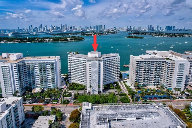 drone / aerial view with a water view and a city view