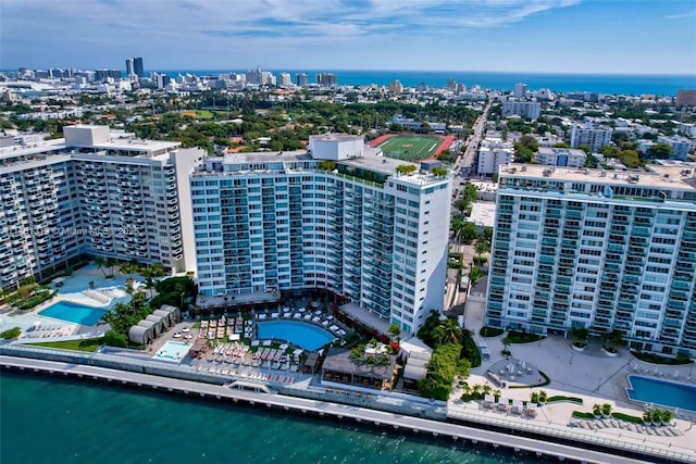 bird's eye view featuring a water view and a view of city