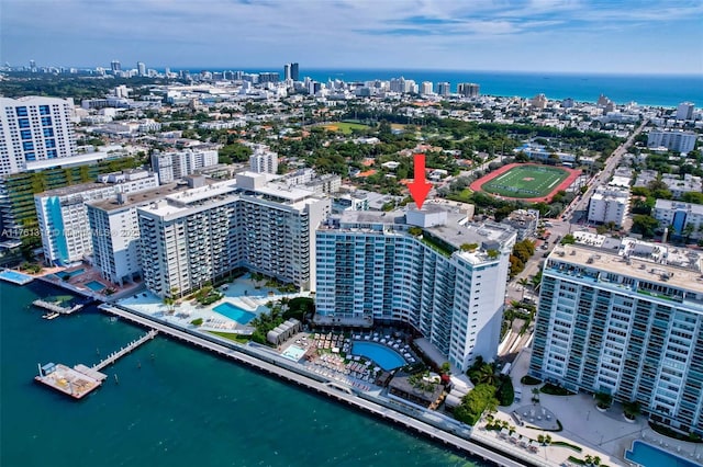 bird's eye view featuring a city view and a water view