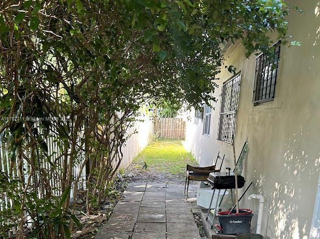 view of patio featuring area for grilling and a fenced backyard