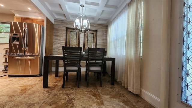 dining area with beamed ceiling, baseboards, coffered ceiling, and an inviting chandelier